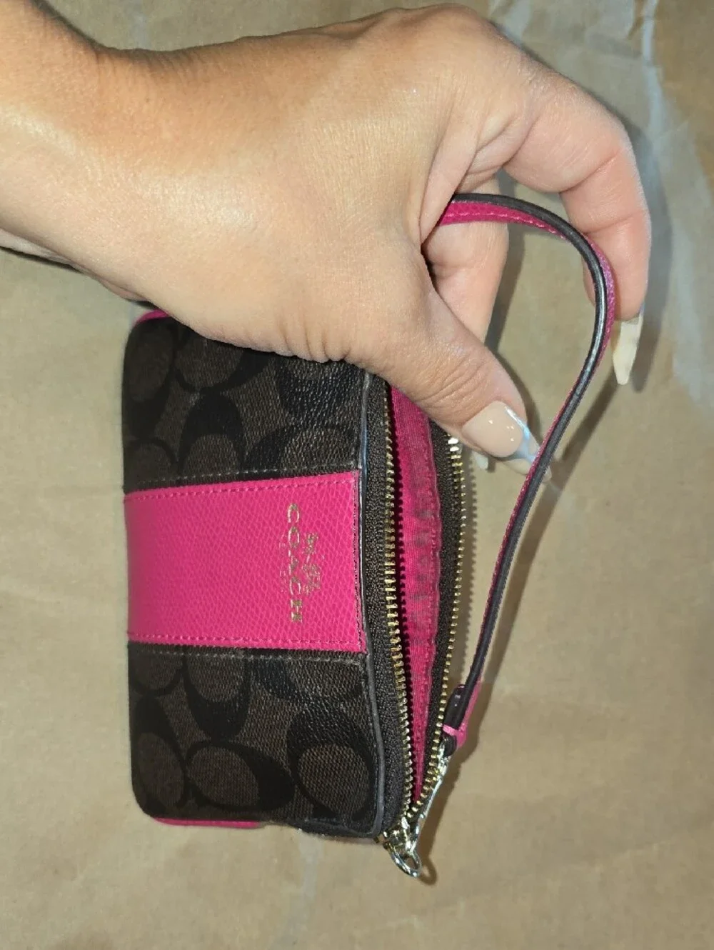 Coach Signature Canvas Wristlet Phone Case in Pink and Brown